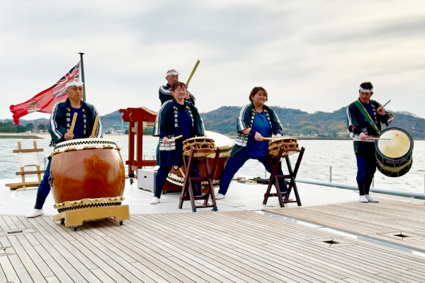 A photo of Sasa-san (right) with a member of the Hamaonishibetsu Fishing Co-op